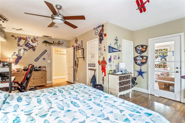 bedroom with ceiling fan and hardwood / wood-style floors