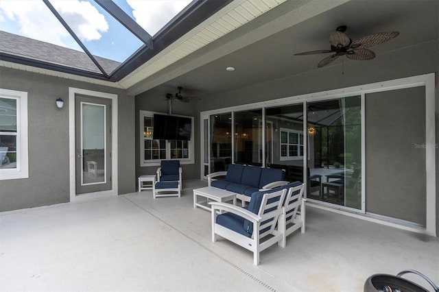 view of patio featuring an outdoor living space and ceiling fan