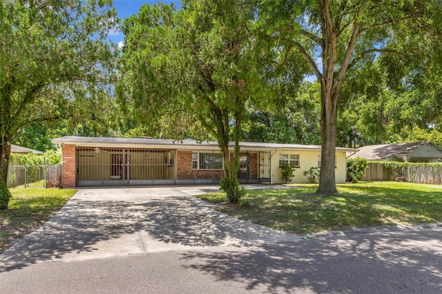 single story home with a front yard