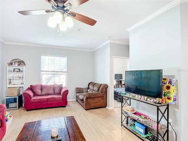 living room with light wood-type flooring, ornamental molding, and ceiling fan