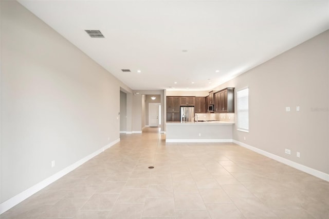 interior space with light tile patterned flooring