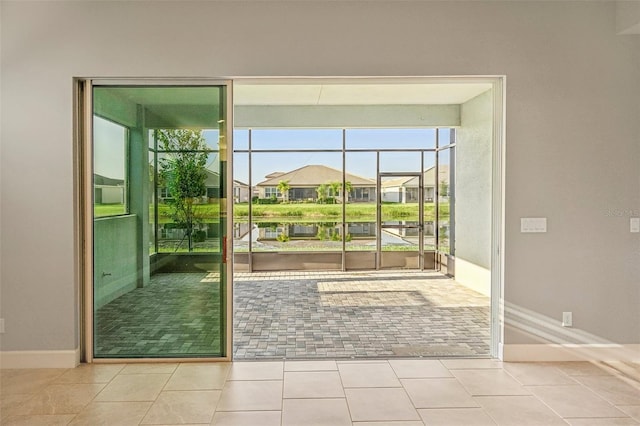 entryway featuring light tile patterned floors