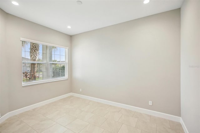 view of tiled spare room