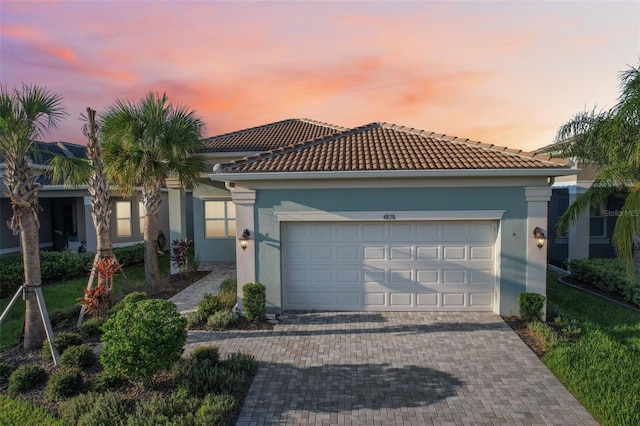 view of front of property featuring a garage