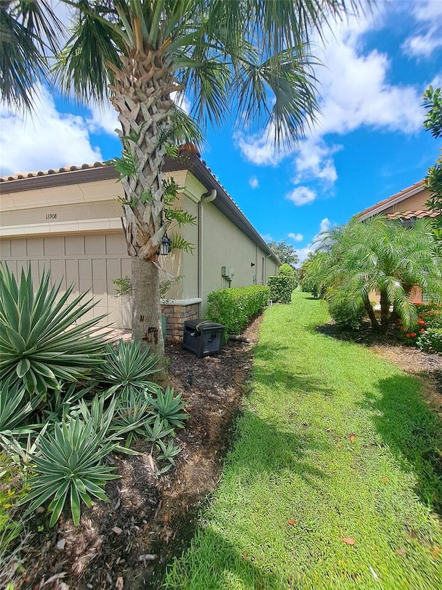 view of yard with a garage