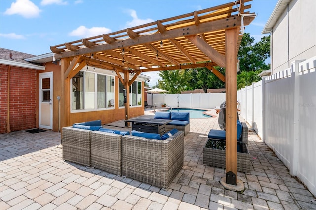 view of patio featuring an outdoor living space with a fire pit, a pergola, and a fenced in pool