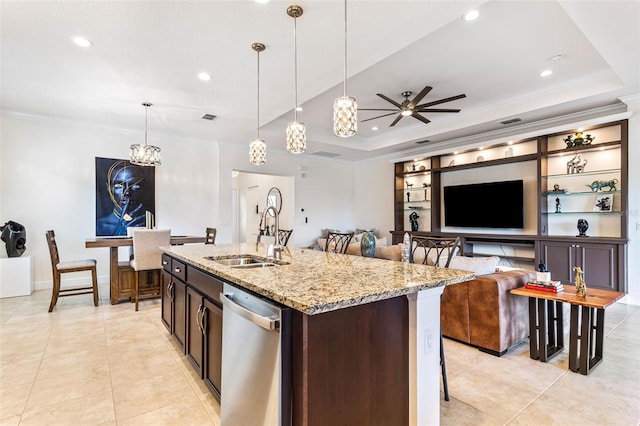 kitchen featuring dishwasher, ceiling fan with notable chandelier, a tray ceiling, and sink