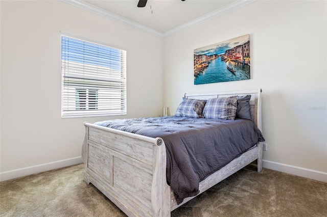 bedroom with crown molding, ceiling fan, and carpet floors