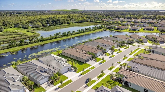 drone / aerial view with a water view