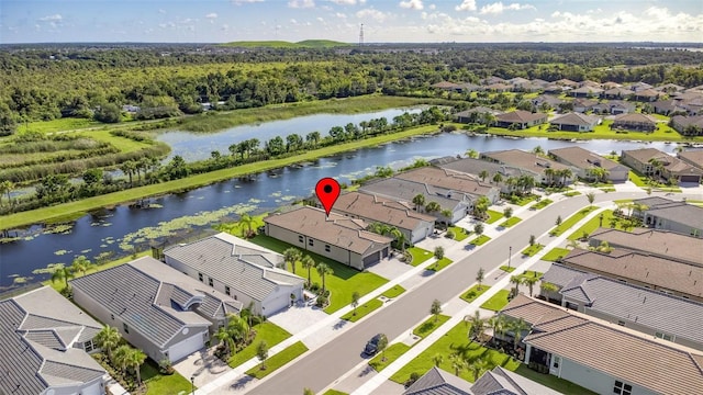 drone / aerial view featuring a water view