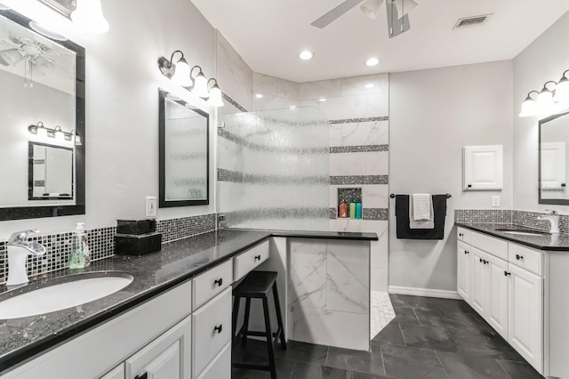 bathroom with tile patterned floors, ceiling fan, and vanity