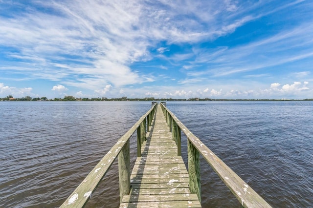 dock area featuring a water view