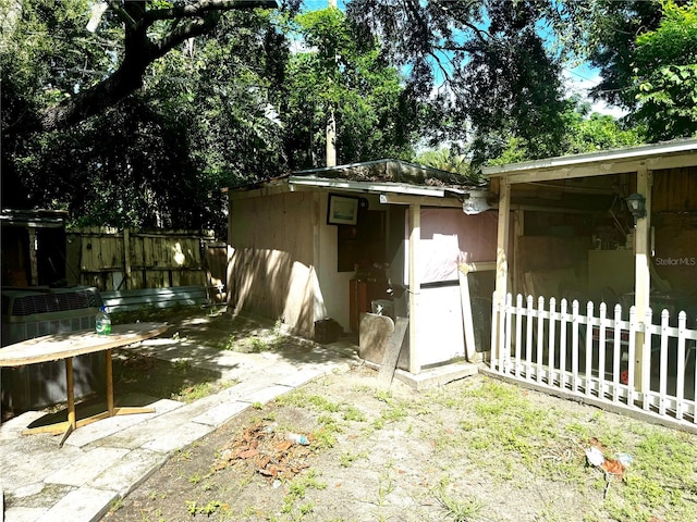 view of outbuilding featuring central AC unit