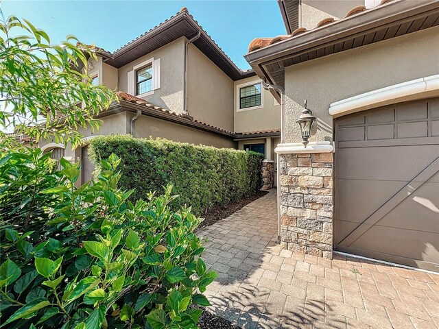 view of home's exterior with a garage