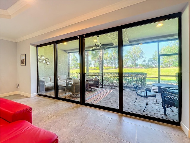 doorway to outside with a sunroom, ceiling fan, baseboards, and crown molding