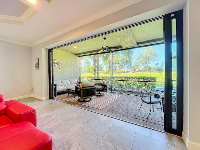 sunroom / solarium with ceiling fan