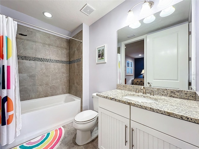 full bathroom featuring ensuite bathroom, toilet, vanity, visible vents, and shower / bath combo