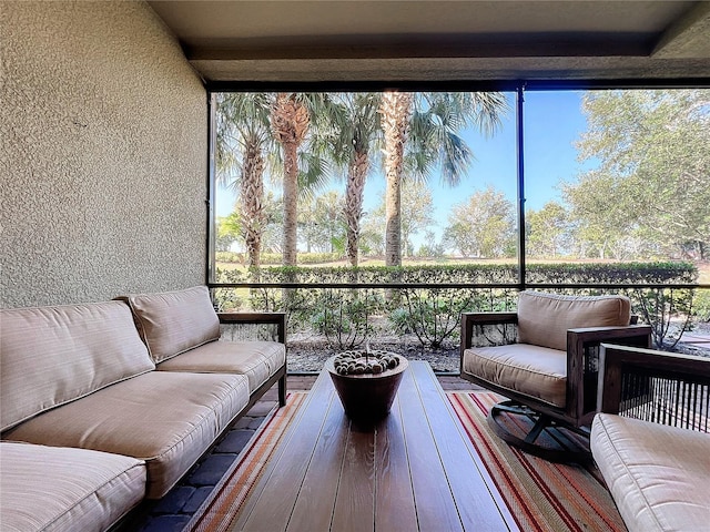 sunroom / solarium featuring a wealth of natural light