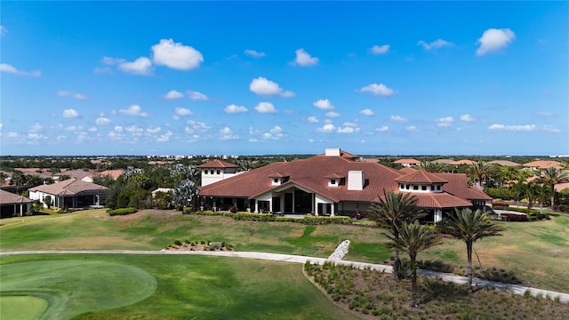 aerial view with view of golf course and a residential view