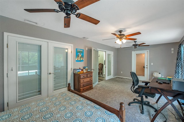 bedroom with ceiling fan, french doors, and carpet flooring