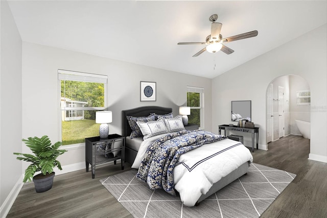 bedroom featuring ceiling fan, multiple windows, and wood-type flooring