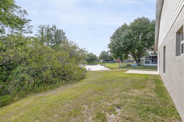 view of yard with a water view