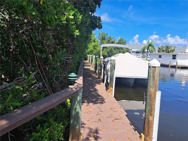 view of dock with a water view