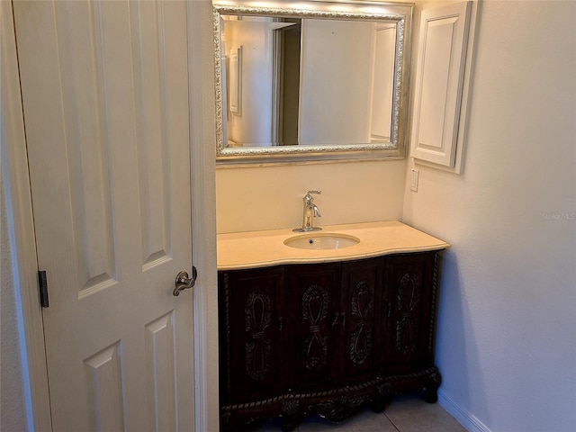 bathroom with vanity and tile patterned flooring