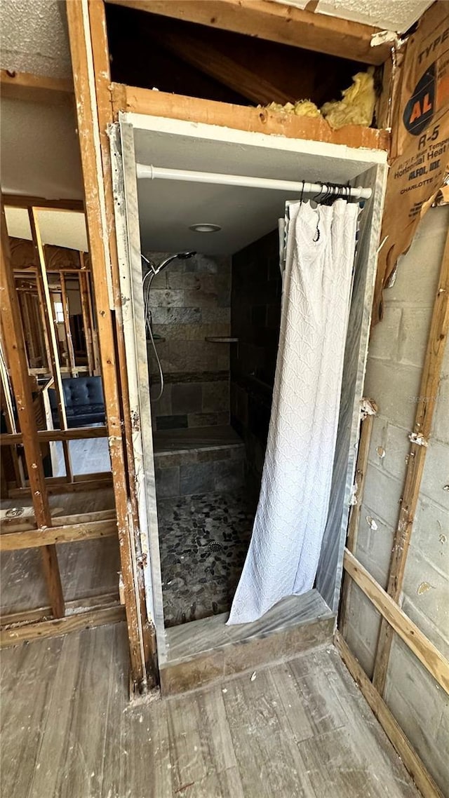 bathroom featuring hardwood / wood-style flooring