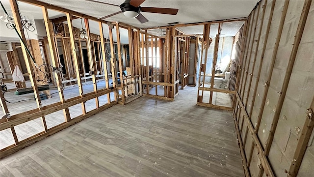 miscellaneous room featuring hardwood / wood-style flooring and ceiling fan