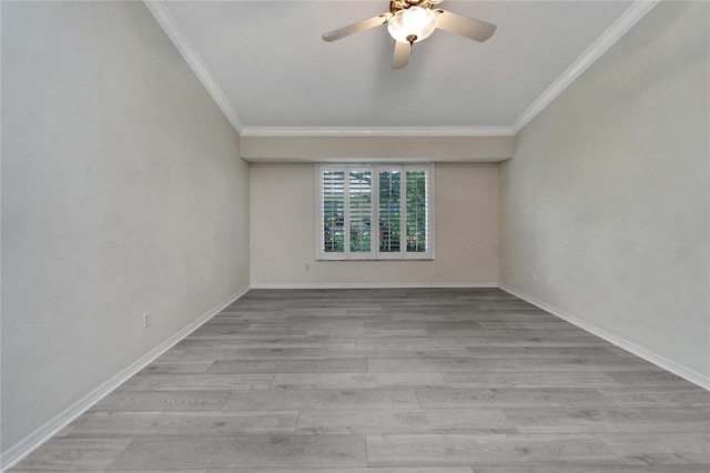 spare room featuring crown molding, ceiling fan, and light wood-type flooring