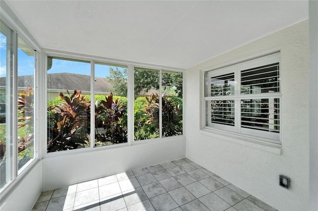 unfurnished sunroom with a wealth of natural light