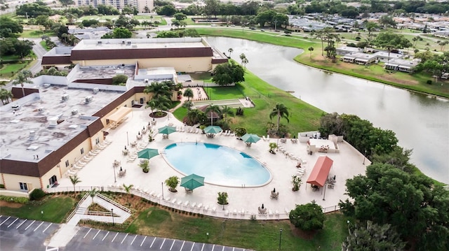 birds eye view of property featuring a water view