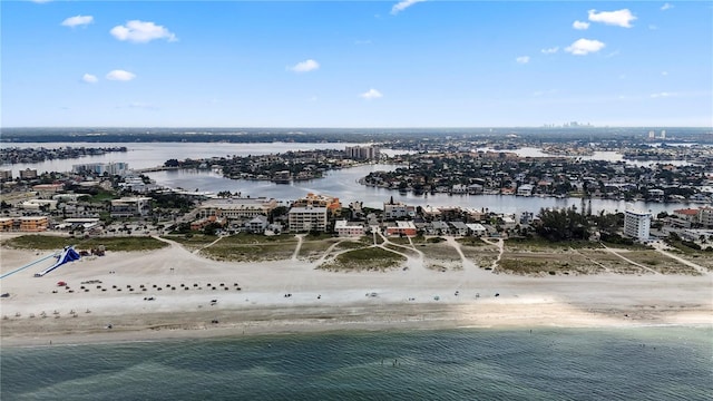 bird's eye view featuring a view of the beach and a water view