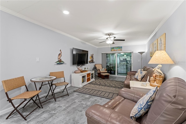 living room featuring ceiling fan, light hardwood / wood-style floors, and ornamental molding