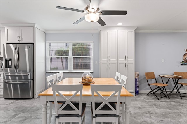 dining area with ceiling fan, light tile patterned floors, and crown molding