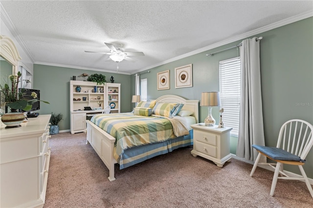 bedroom featuring a textured ceiling, ceiling fan, multiple windows, and light colored carpet