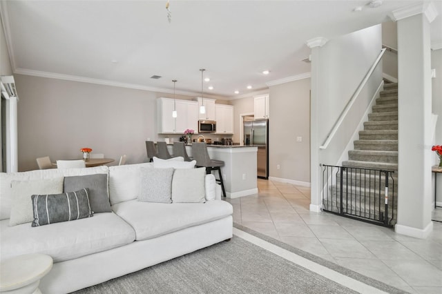 living room with recessed lighting, crown molding, stairway, and light tile patterned floors