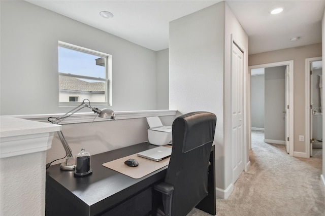 office area featuring recessed lighting, light carpet, and baseboards