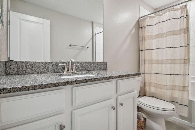 full bathroom with toilet, shower / tub combo with curtain, and vanity