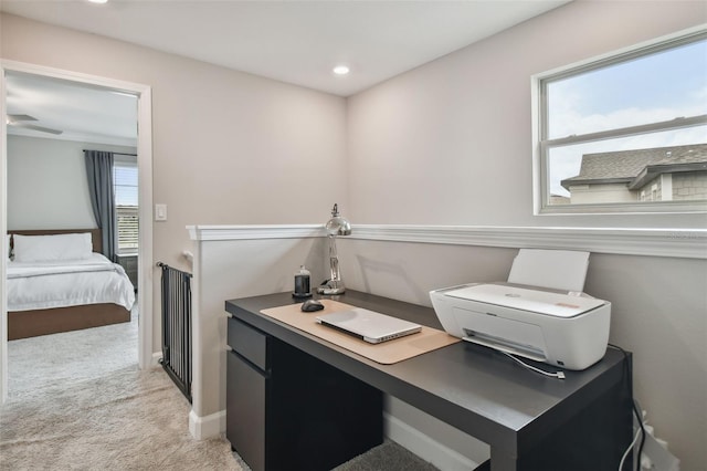 office space featuring recessed lighting, light colored carpet, and baseboards