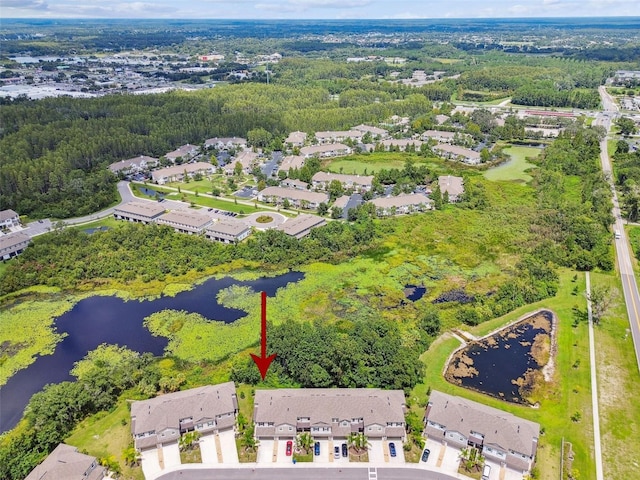 aerial view featuring a water view and a residential view