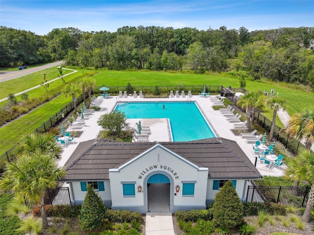 exterior space featuring a yard, fence, and a patio