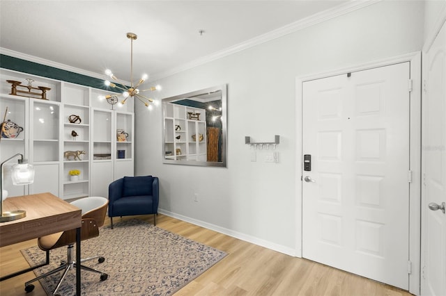 office area with light hardwood / wood-style floors, a chandelier, and ornamental molding