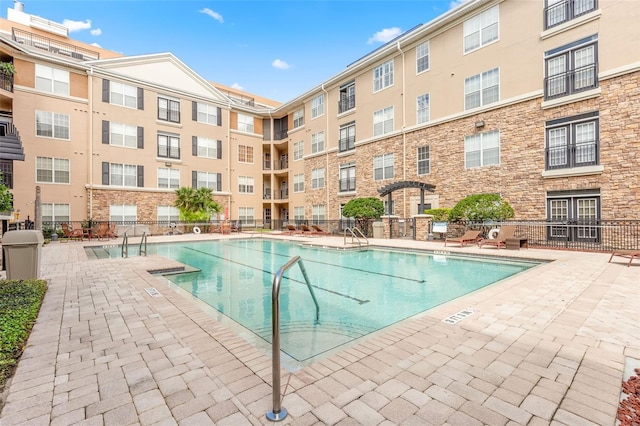 view of pool with a patio area