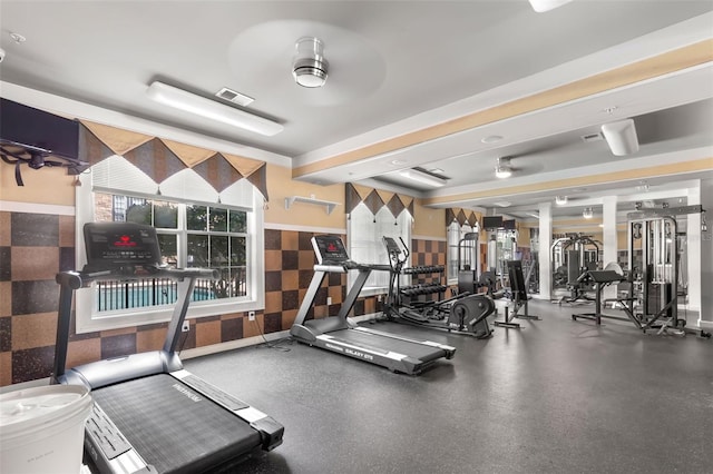 workout area featuring ceiling fan