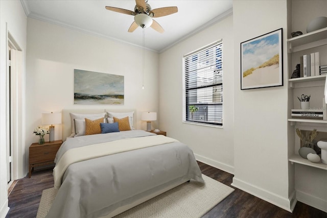 bedroom featuring dark hardwood / wood-style flooring, ornamental molding, and ceiling fan