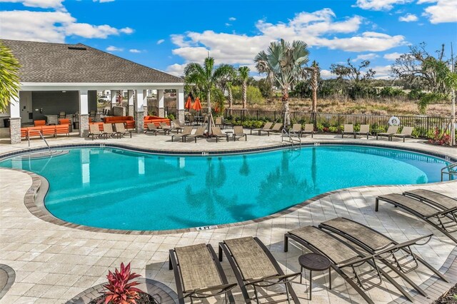 view of pool with a patio area