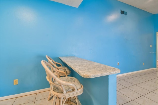 kitchen featuring light tile patterned floors