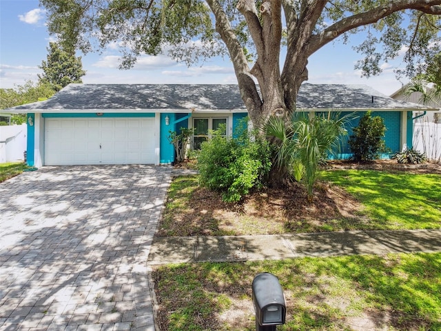 single story home with a garage